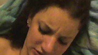 Cute brunette with smoky eyes gives blowjob.