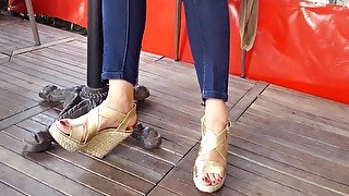 filming her sexy long feets hot red toes under table