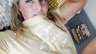 Blue eyed blonde touches herself and spreads her pussy lips