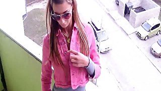 Buxom temptress in sunglasses is masturbating on the balcony