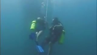 Scuba Blonde Sucks Two Dicks