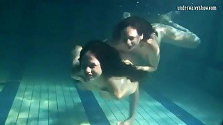 Underwater workout and fun with two beauties