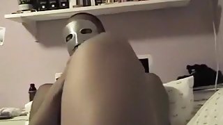 Masked brunette white girl gives her black bf a blowjob and footjob ending with a facial