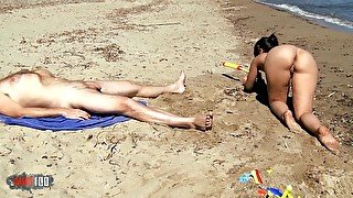 Chubby young slut playing naked on the beach and peeing on a guy