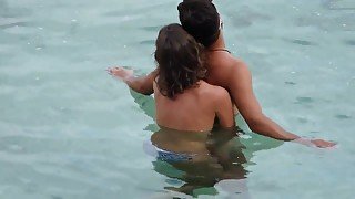 Sex on Greek beach. Handjob under water.