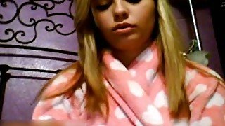 Blonde teen shows her body and fingers her smooth vagina