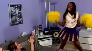 Ebony girl in cheerleader uniform gets fucked by White man