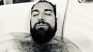 Big hairy and very horny Italian bearded daddy bear wanking in the foam bathtub and moaning a lot