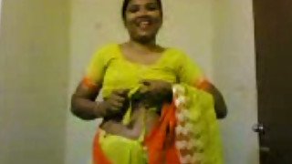 Lewd amateur Indian housewife flashes her ugly natural titties