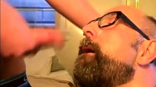 Bearded guy takes two loads to the face from his buddy