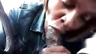 Slut sucking black dick in the car