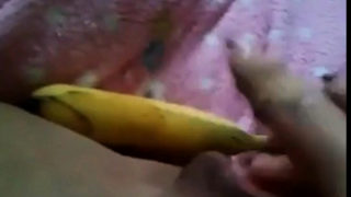 Arab slut masturbate with a big banana