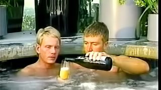 A guy gets oiled up and then fucked by the pool by another man