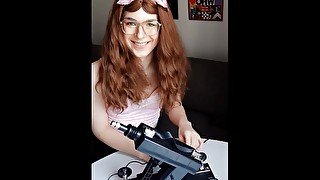 Crossdresser unboxing a sex machine