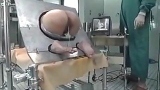 Milf Bound In A Machine And Takes An Enema In Her Ass