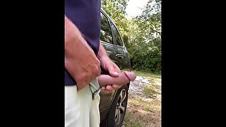 Outdoor cumshot followed by huge steaming piss next to busy road. Public pissing orgasm.