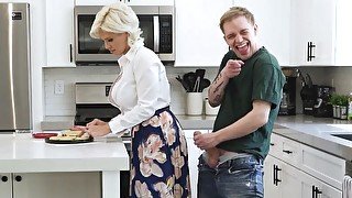 Charli Phoenix is sucking her stepson's cock in the kitchen