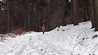 Girls in need skate around in the snow to find a proper place to have a pee