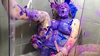 BBW in bondage covered in paint and orgasming with wand