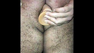 Big Italian bearded horny bear playing with dildo in his hairy ass during a party with friends