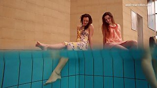 Mesmerizing pair of hot and sexy whtie teen babes in the pool