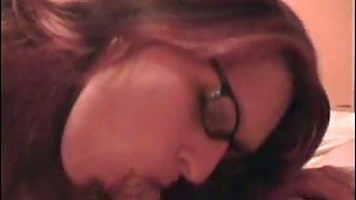 Nerdy redhead girlfriend enjoys sucking my stiff delicious cock