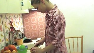 Busty and frisky blonde amateur girl in the kitchen