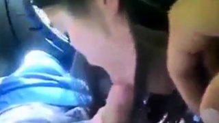 Cute college girl gives a car blowjob