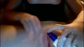 She squeezes some cream on her pussy and starts masturbating