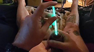 Cumming while sounding with green glowstick