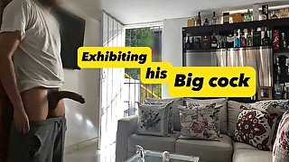 Showing his big cock while the door of his house is open