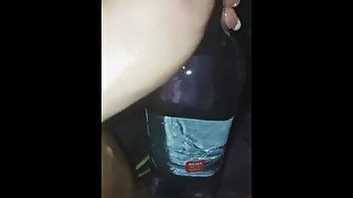 Bottle in a loose pussy