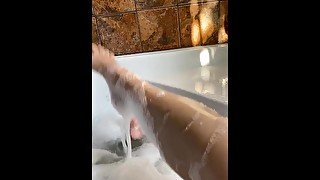 Soapy feet playing with my dildo