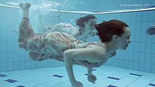 Two Dressed Beauties Underwater Netrebko And Poleshuk