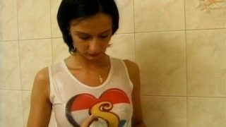 Horny brunette teen masturbates in the shower