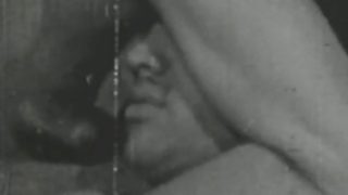 Black and white vintage video of lady sucking her lover