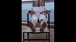 Straight stud relaxes on cruise while you admire his feet