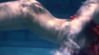 Two hot lesbians underwater touching eachother