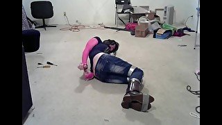 crossdresser in multiple bondage positions 2