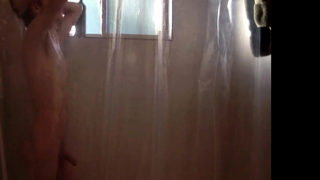 Twink takes shower while being recorded