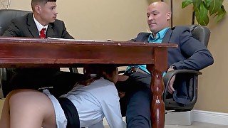 Hazel Heart is sucking Sean Lawless' cock under the table