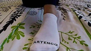 Neighbor's wife gives me a socksjob, a handjob in beautiful white socks, I cum on her little feet