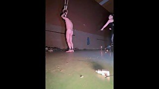 submissive slave training abandoned building