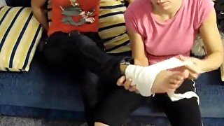 2 Girls with 3 Injured Feet Wrapped in Bandage and Wearing Flats