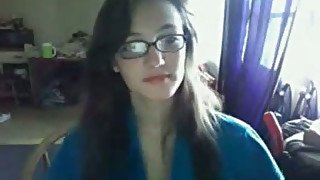 Cutie chick in glasses having fun on webcam by masturbating