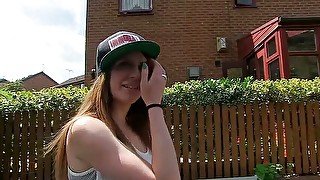 Busty brunette pissing outdoors for the camera