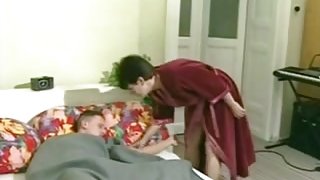 Aged granny landlady wakes her youthful lodger with a fuck