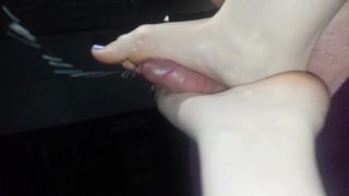 Quick Footjob - he cant hold back his massive load