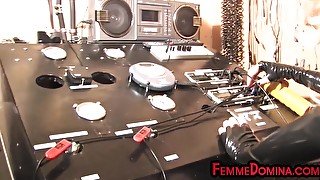 Femdom BDSM latex domina torments sub with cock pump