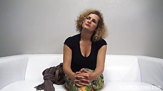 Blonde woman with curly hair is getting fucked during a job interview and moaning while cumming